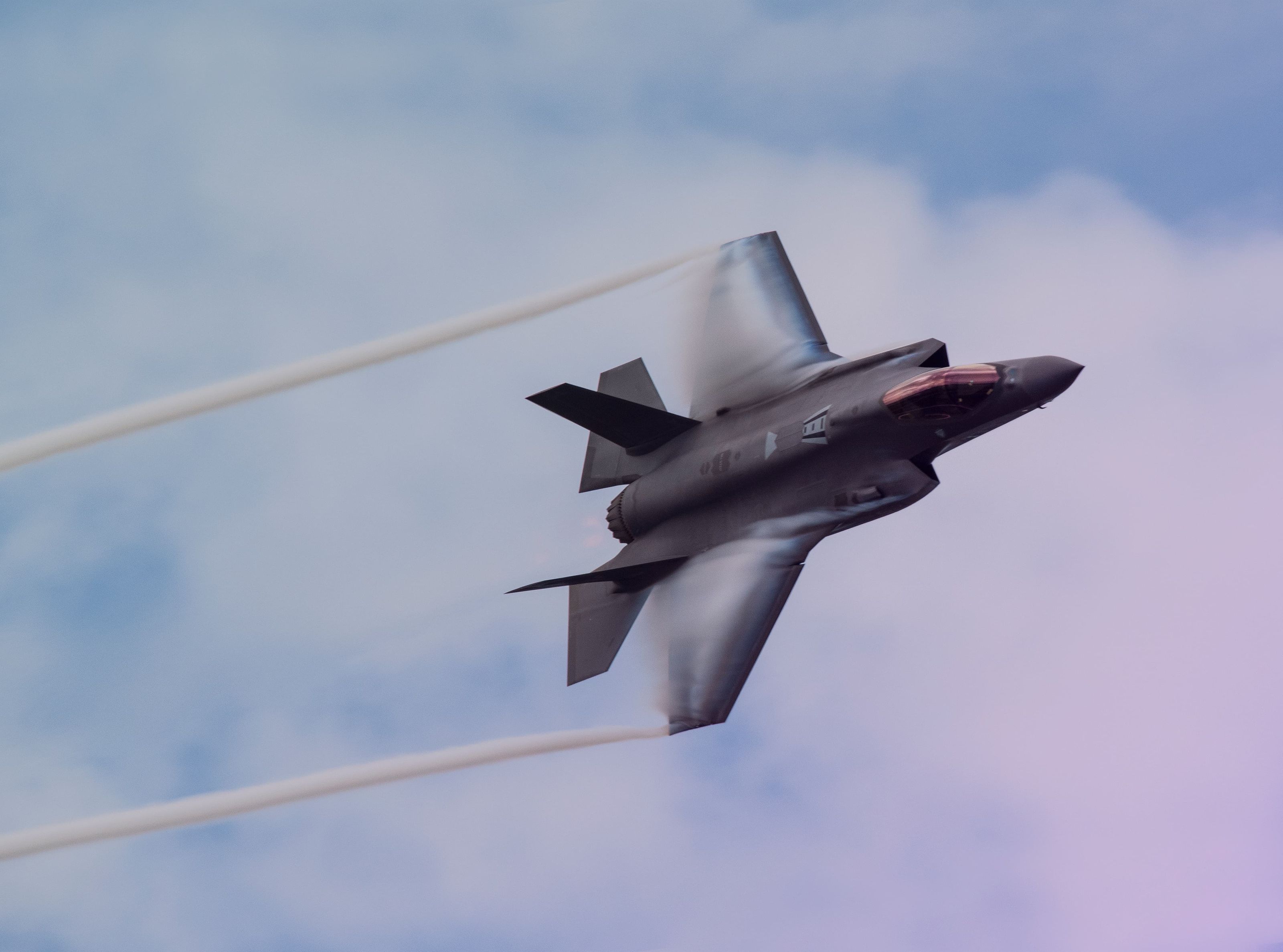 Soft pink and baby blue water ripples together in a subtle texture.